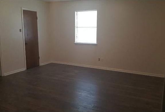 Hardwood flooring in master bedroom