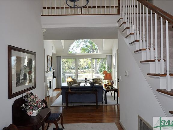Foyer opens to the Living Room with gorgeous views