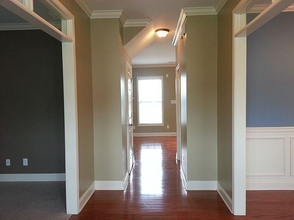 Front Foyer on right is Dining Room, on left is Office, look