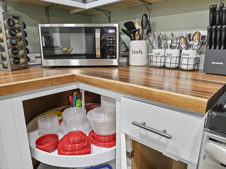 Fully stocked kitchen with drip coffee maker, blender, pots, pans, seasonings, etc. All your kitchen needs are here.