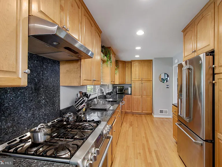 9504 Wadsworth Dr — Photo 14