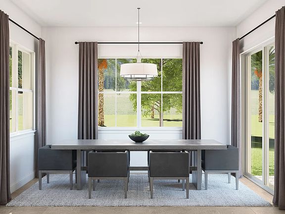 Dining area with slider to covered patio