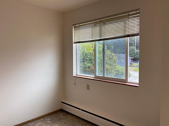 Dining room with a window.