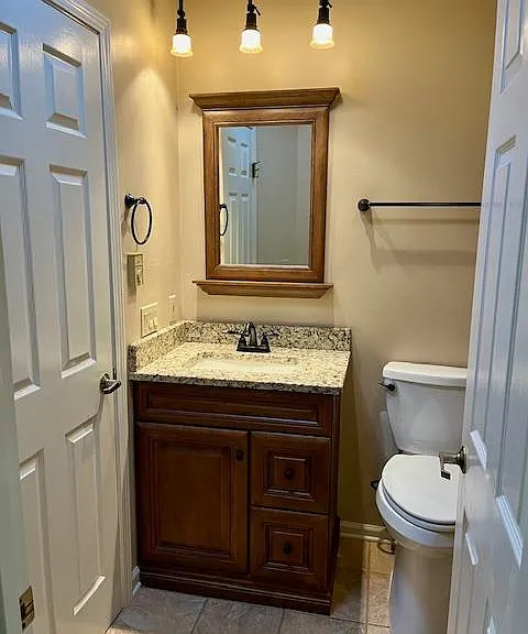 Full bath access from the hall.