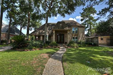Beautiful Custom Brick on wooded lot.
