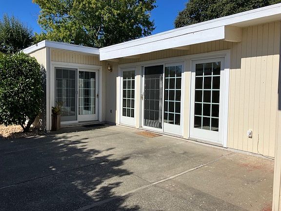 Court yard with entrances to living room and primary bedroom.