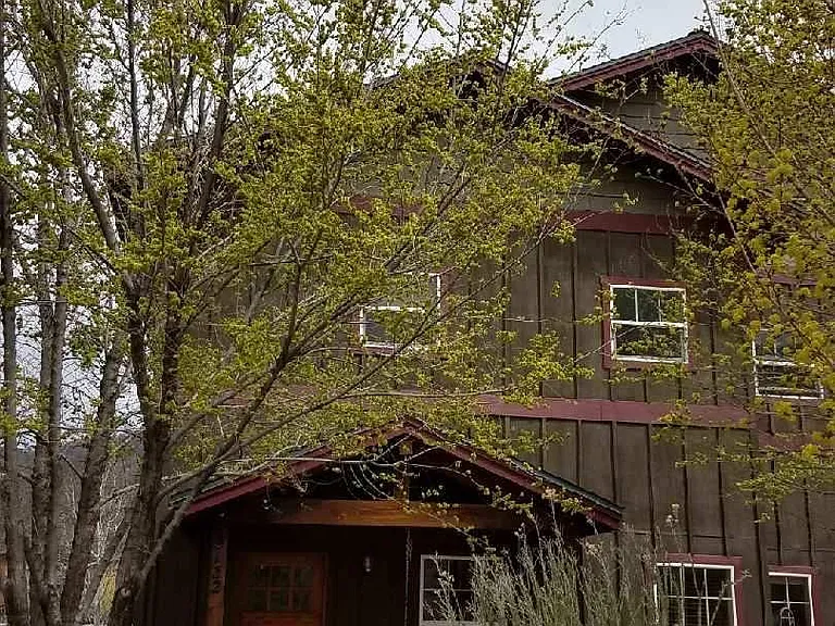 Front of home, note lawn maintenance is provided by landlord
