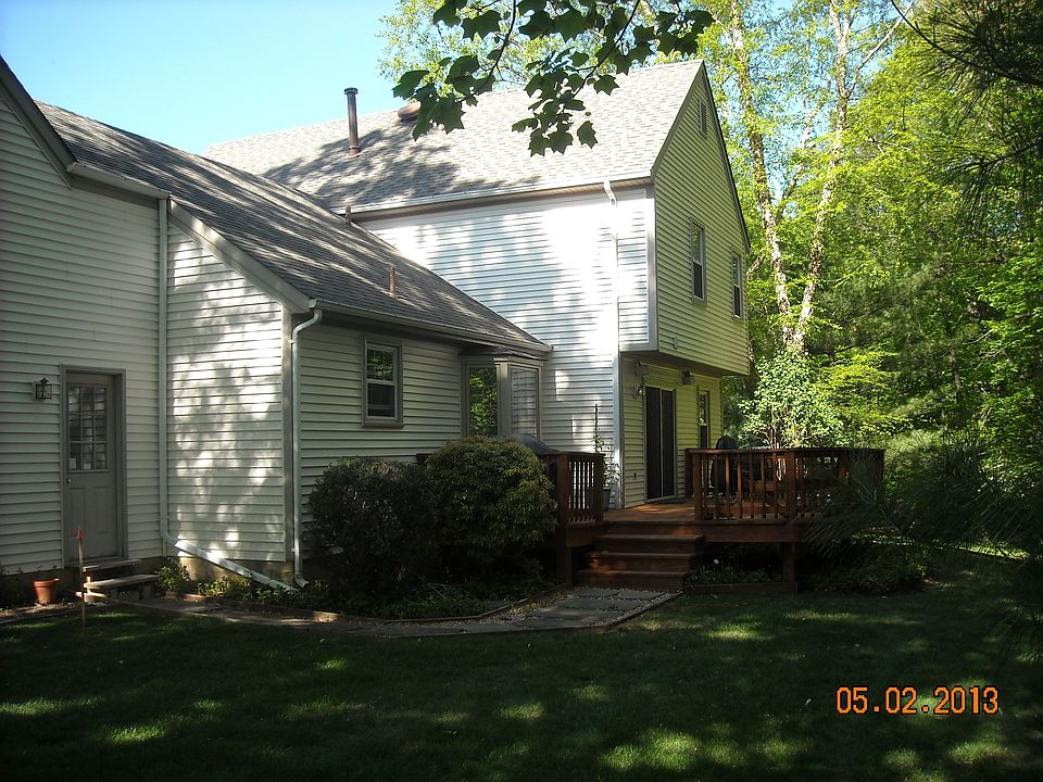 wooded area in rear