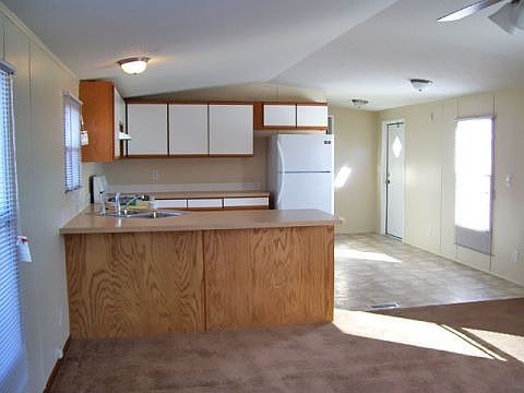 2nd image of 4211 E 100th Ave Lot 379