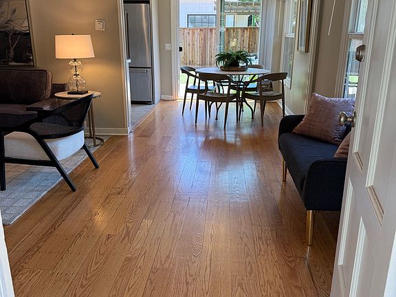 Entryway, living room & dining area (Staged)