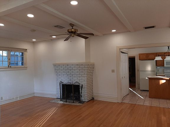 Huge open great room area with Wood burning FIRE PLACE, 12 Newly installed CEILING Recessed LED lights with dimmer controls in Great Room and Dining area give great lighting to this room at night. Note: 9 1/2+ foot ceiling heights throughout entire house