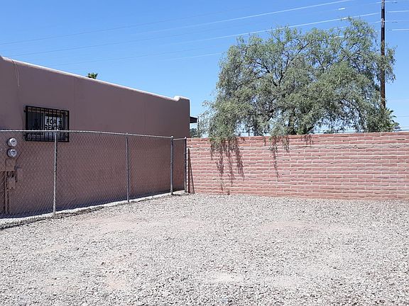 Two car parking off road.