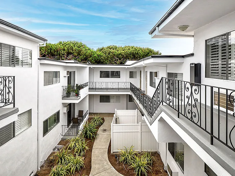 Modern styled courtyard with walk up access to apartment homes.