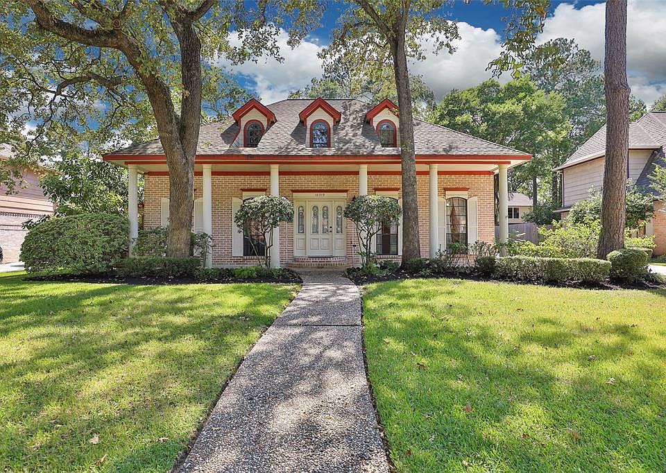 Welcome home! Home sits far back on large lot with mature trees and front porch that extends the width of the home.