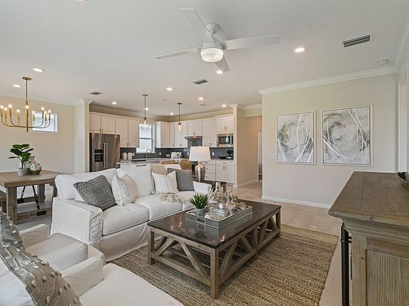 Open living areas with connected tile flooring