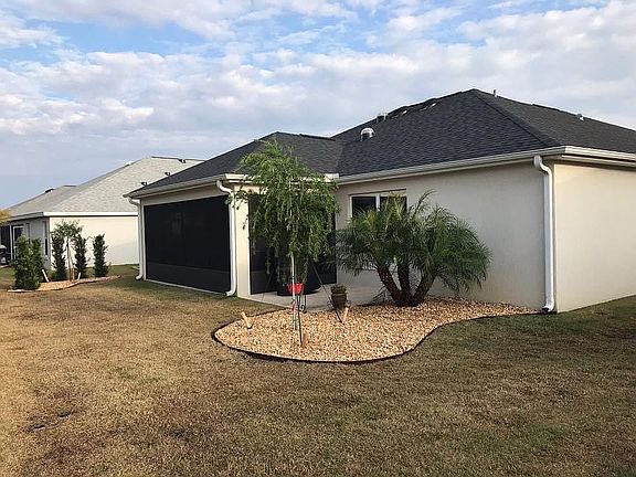 Rear with new landscaping 