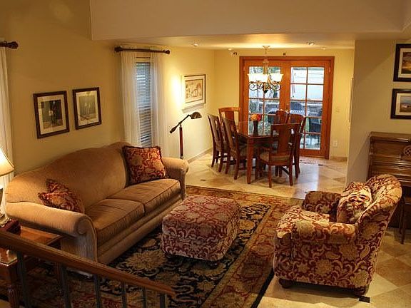 Living Dining Area With French Door to Backyard Patio