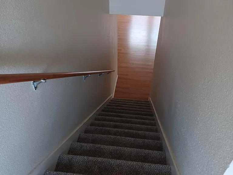 stairs to upstairs. new carpet