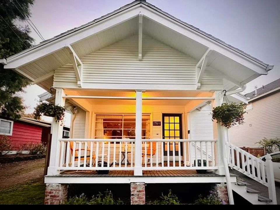 Large inviting front porch in quiet neighborhood