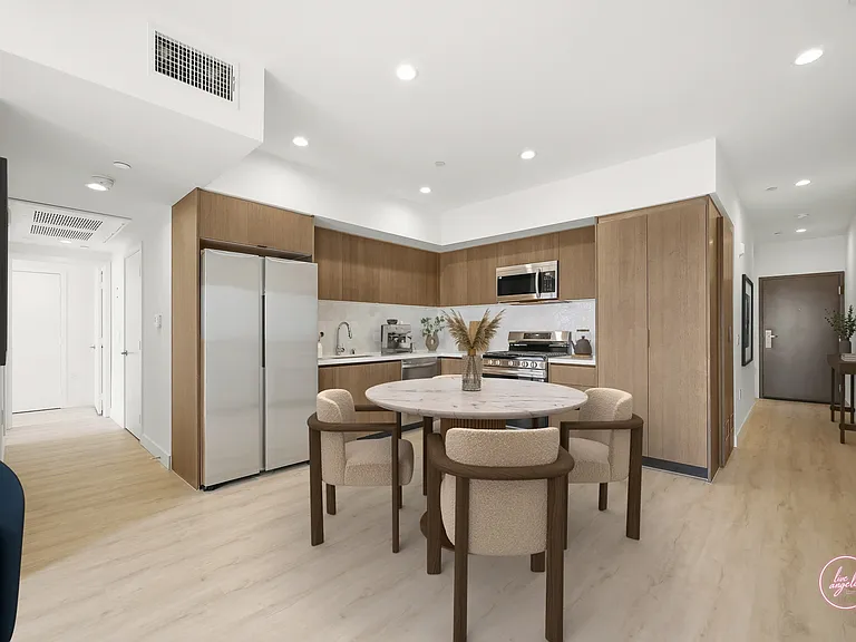 Open-Concept Kitchen with Stainless-Steel Samsung Appliances- Cobain Floor Plan