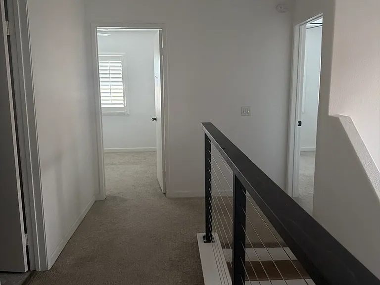 Hallway to laundry room, and bedroom 2/3