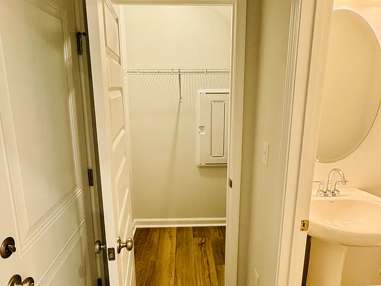 Car Garage Entry leads to a half bath and storage area- view 2