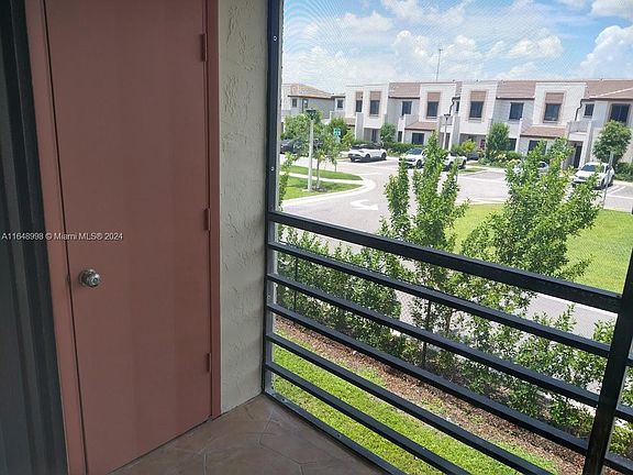 3rd image of 911 NE 209th Ter APT 204
