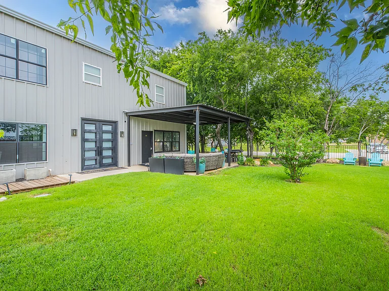 Modern exterior with a clean, open layout and private yard.