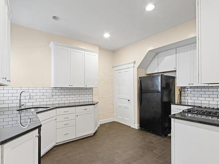 The Kitchen with lots of cabinets for storage