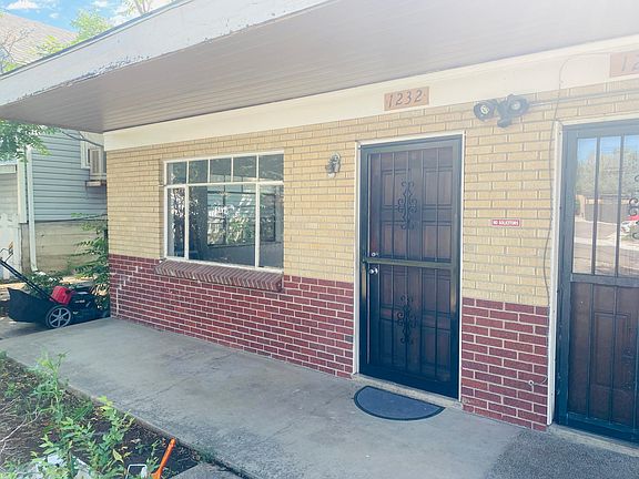 One side of a duplex with a nice front porch