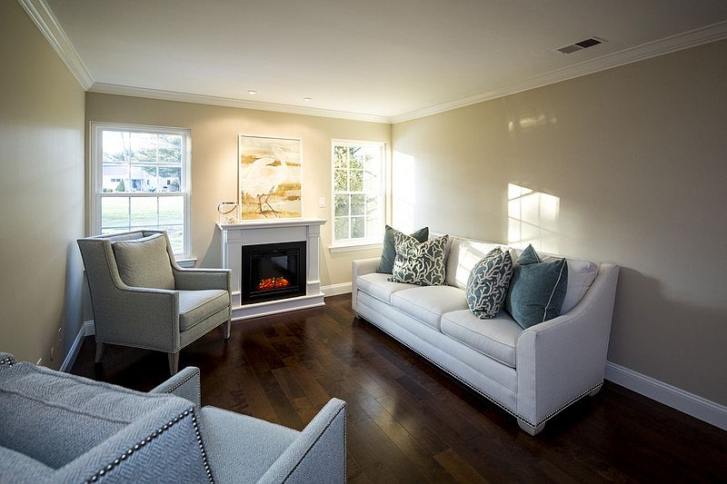 Living Room Area : Fireplace... wood flooring throughout entire home