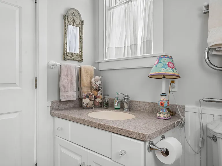 1st Floor 1/2 Bathroom - Washer & Dryer are located here as well.
