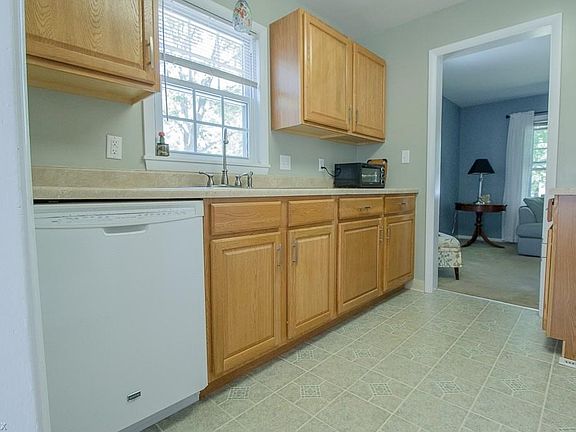 The working Kitchen is sandwiched between the Family and Dining Rooms.
