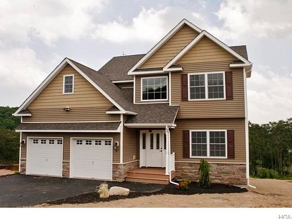 FINISHED PHOTOS OF SIMILAR HOUSE BUILT BY SAME BUILDER.