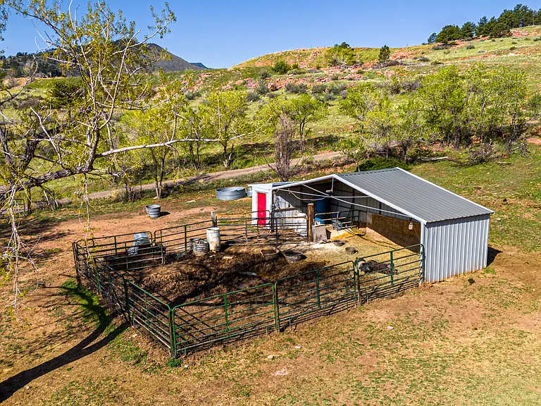 Loafing shed on ranch property where horses are boarded