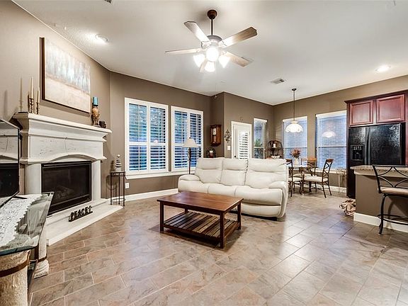 Living room not only offers full view of surrounding areas but also wonderful natural light!