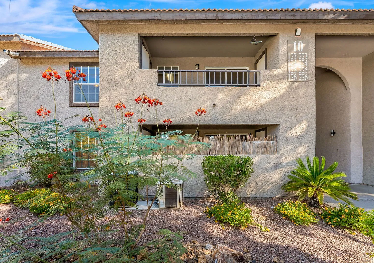 Welcome to this second floor condo in a gated community! — Photo 1
