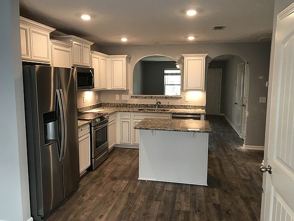 Stock photo standing in breakfast area looking back into kitchen. Nice