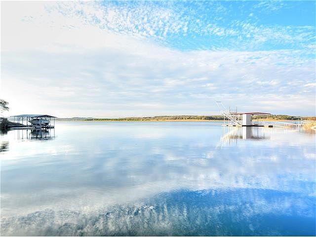 WAKE BY THE LAKE in this stunning Lake Travis Waterfront Home!!!