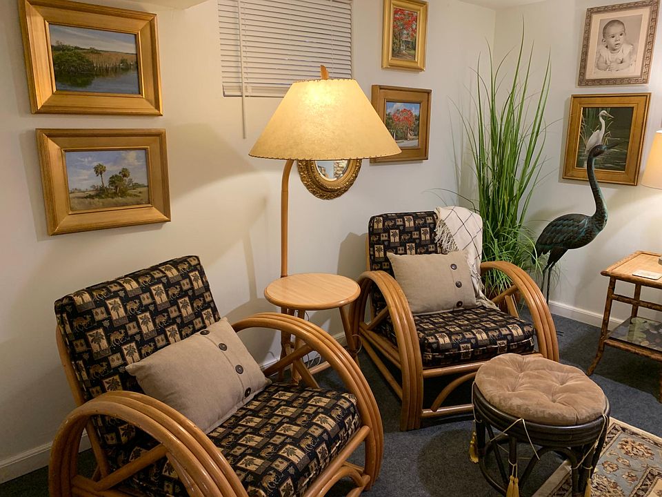 Vintage rattan, newly upholstered, Florida oil paintings