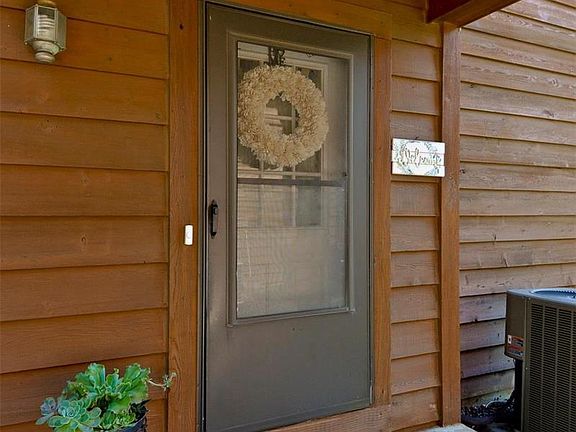 Covered Front Porch and Screen Door.