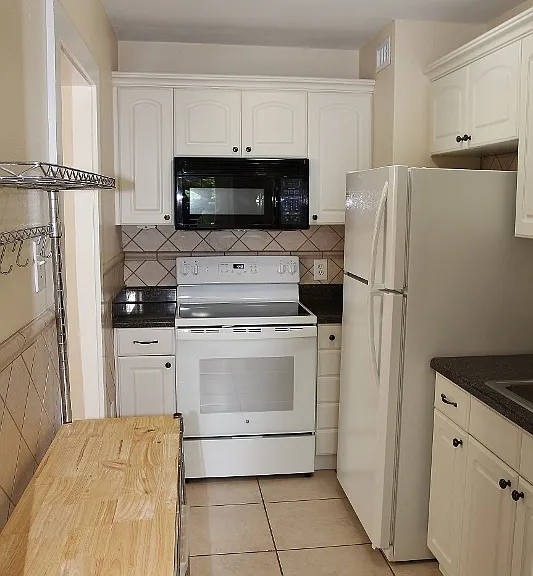 Black Microwave Was Replaced With "Brand New" White Matching Microwave.