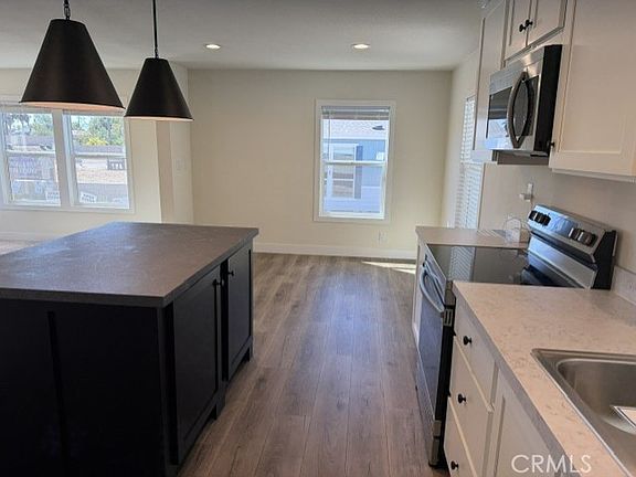 4th image of 3444 Center St #65