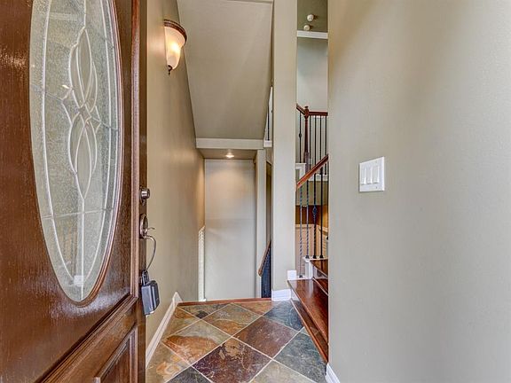 Your guest entrance place them on the second floor where the action it...the den, dining, kitchen and a half bath and the laundry are all on the second level. The second level also features a balcony at both the front and rear of the home.