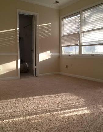 Master bedroom with full bath and skylight over shower