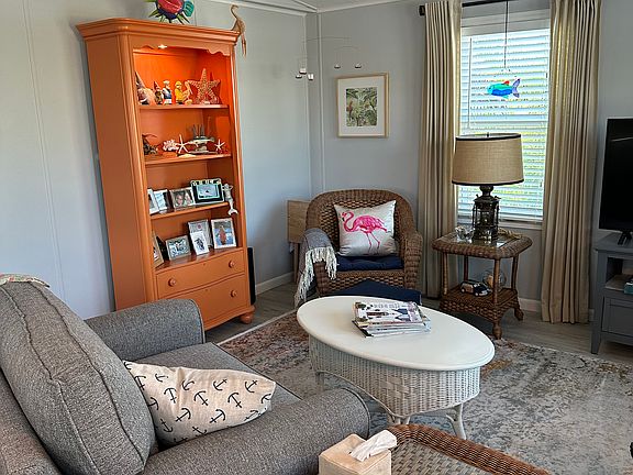 Living room with vaulted ceilings and LVP flooring