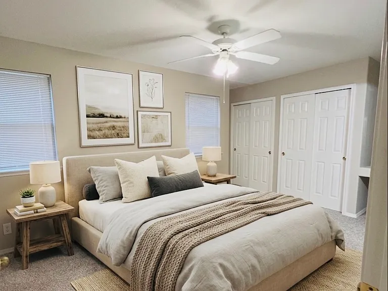 Upstairs primary bedroom, virtually staged to show possible furniture placement
