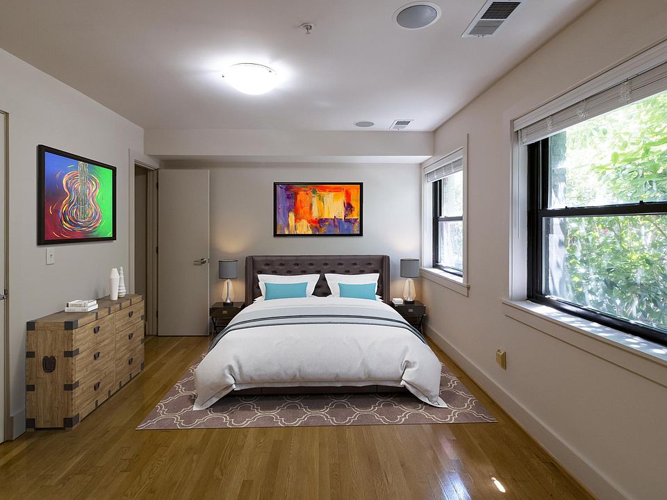 Bedroom with 3 closets. (Virtually staged.