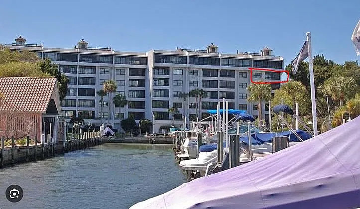 Back of bulding with boat basin waterway