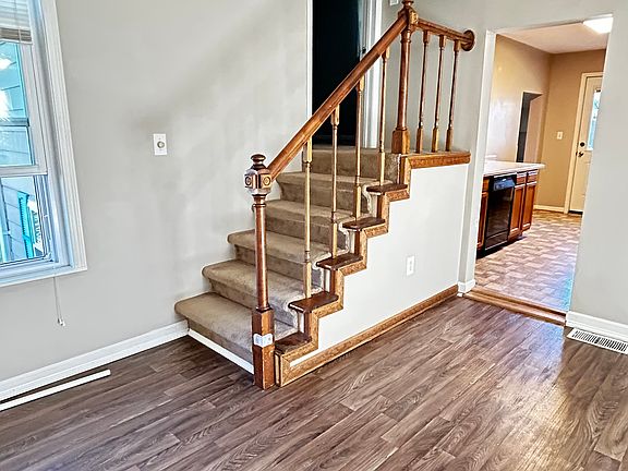 Stairs to bedroom #2 off dining area